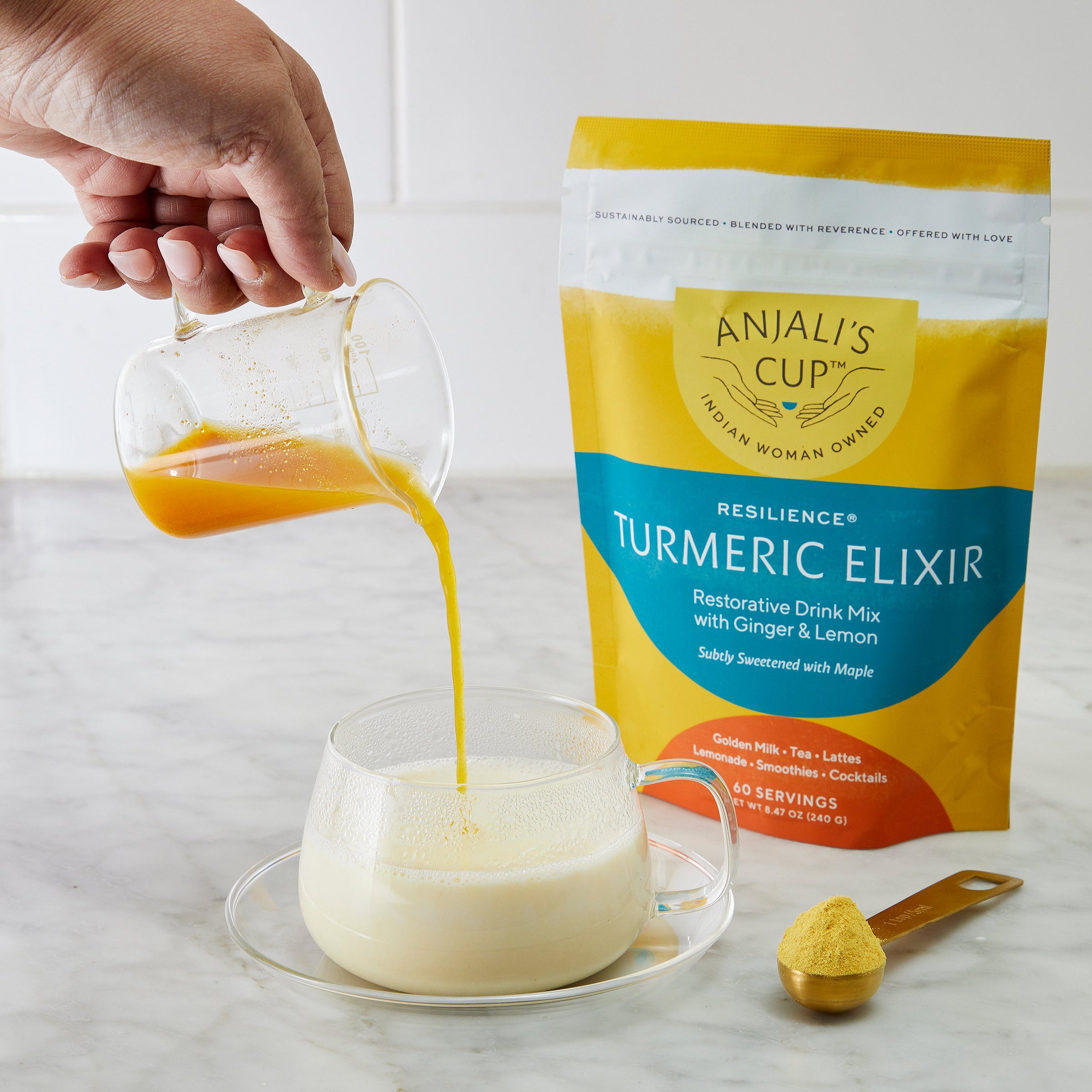 Shop Resilience Turmeric Elixir | 60 Serving Pouch | Bright Golden